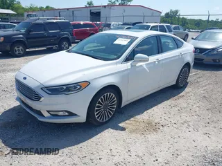 2018 Ford Fusion Titanium with VIN 3FA6P0D98JR134230, listed as a IAAI auction lot 42567084 with 107,459 mi miles and . Bid and sale history available at DreamBid. Image 17.