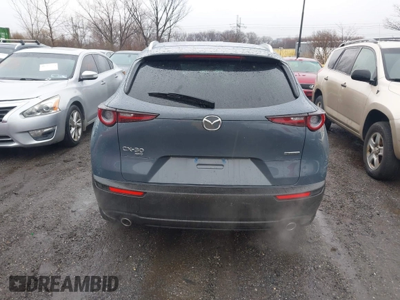 2024 Mazda CX-30 S Carbon Edition z VIN 3MVDMBCM7RM606050, wystawiony jako IAAI lot #41807459 z przebiegiem 7908 mil mil oraz . Historia ofert i sprzedaży dostępna na DreamBid. Obrazek 16.