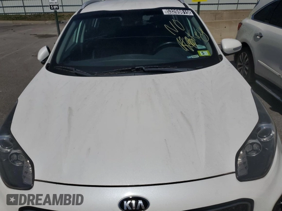 2019 Kia Sportage EX z VIN KNDPNCACXK7495151, wystawiony jako Copart lot #53269815 z przebiegiem 122 706 mil mil oraz Czysty tytuł • Clean title. Historia ofert i sprzedaży dostępna na DreamBid. Obrazek 11.