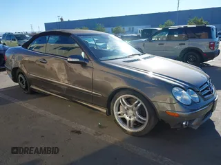 2008 Mercedes-Benz CLK 550 with VIN WDBTK72GX8T091054, listed as a IAAI auction lot 41296902 with 76,271 mi miles and . Bid and sale history available at carsss.com. Image 1.