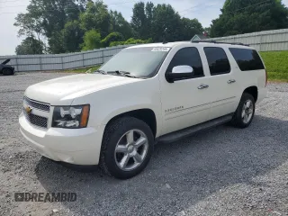 2014 Chevrolet Suburban LTZ with VIN 1GNSKKE70ER237697, listed as a Copart auction lot 60029745 with 86,469 mi miles and Salvage title. Bid and sale history available at DreamBid. Image 1.