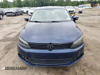 2011 Volkswagen Jetta SE z VIN 3VWDZ7AJ9BM012040, wystawiony jako Copart lot #66552264 z przebiegiem 171 529 mil mil oraz Czysty tytuł • Clean title. Historia ofert i sprzedaży dostępna na DreamBid. Obrazek 5.