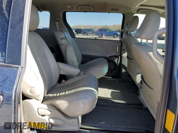 2014 Toyota Sienna XLE with VIN 5TDYK3DC5ES467244, listed as a Copart auction lot 54777445 with 157,503 mi miles and Salvage Title. Bid and sale history available at DreamBid. Image 11.