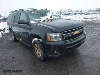 2013 Chevrolet Suburban LT with VIN 1GNSKJE7XDR225923, listed as a IAAI auction lot 41546141 with 234,723 mi miles. Bid and sale history available at carsss.com. Image 1.