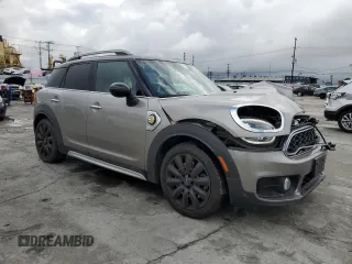 2018 MINI Countryman Cooper S E with VIN WMZYU7C47J3E56482, listed as a Copart auction lot 48877985 with 60,829 mi miles and Salvage Title. Bid and sale history available at carsss.com. Image 4.