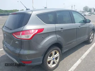 2013 Ford Escape SE с VIN 1FMCU9GX0DUC06423, выставлен на аукционе IAAI как лот 42421363 с пробегом 187 057 миль миль и . История ставок и продаж доступна на DreamBid. Изображение 4.