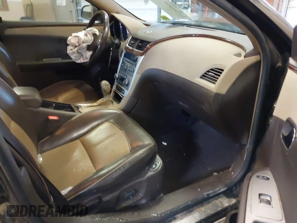 2009 Chevrolet Malibu LTZ with VIN 1G1ZK577X94153081, listed as a IAAI auction lot 41528004 with 217,988 mi miles and . Bid and sale history available at DreamBid. Image 5.