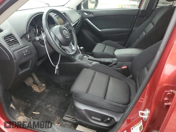2014 Mazda CX-5 Touring z VIN JM3KE4CY3E0382106, wystawiony jako Copart lot #55521645 z przebiegiem 84 539 mil mil oraz Szkoda całkowita • Salvage title. Historia ofert i sprzedaży dostępna na DreamBid. Obrazek 7.