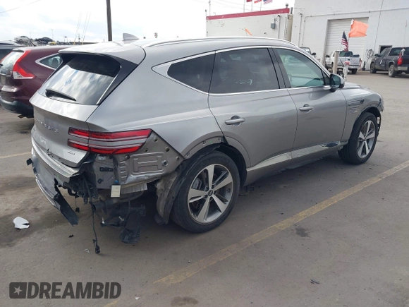 2023 Genesis GV80 with VIN KMUHBDSB2PU113046, listed as a IAAI auction lot 41516832 with 53,897 mi miles and . Bid and sale history available at DreamBid. Image 4.
