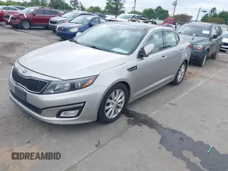 2015 Kia Optima EX with VIN 5XXGN4A70FG422277, listed as a IAAI auction lot 41932887 with 150,386 mi miles. Bid and sale history available at carsss.com. Image 17.