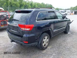 2011 Jeep Grand Cherokee Laredo with VIN 1J4RR4GG8BC543468, listed as a IAAI auction lot 42431481 with 224,639 mi miles and . Bid and sale history available at DreamBid. Image 4.