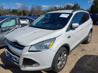 2013 Ford Escape SEL with VIN 1FMCU0HX0DUC07372, listed as a IAAI auction lot 41740884 with 96,436 mi miles and . Bid and sale history available at DreamBid. Image 2.