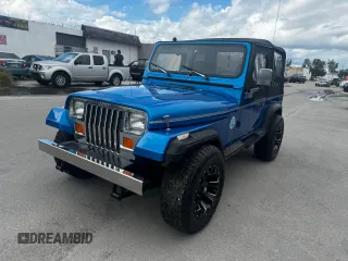 1992 Jeep Wrangler z VIN 2J4FY19P6NJ559597, wystawiony jako Copart lot #81398954 z przebiegiem 150 310 mil mil oraz Szkoda całkowita • Salvage title. Historia ofert i sprzedaży dostępna na DreamBid. Obrazek 2.