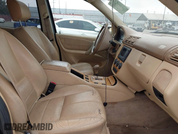 2005 Mercedes-Benz M 500 with VIN 4JGAB75EX5A532297, listed as a IAAI auction lot 42794563 with 200,481 mi miles and . Bid and sale history available at DreamBid. Image 5.