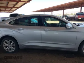 2017 Chevrolet Impala LT with VIN 1G1105S38HU210996, listed as a IAAI auction lot 42294290 with 96,250 mi miles and . Bid and sale history available at DreamBid. Image 12.