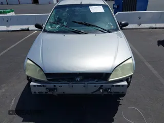 2007 Ford Focus S z VIN 1FAHP34NX7W163158, wystawiony jako IAAI lot #42586421 z przebiegiem 123 131 mil mil oraz . Historia ofert i sprzedaży dostępna na DreamBid. Obrazek 6.