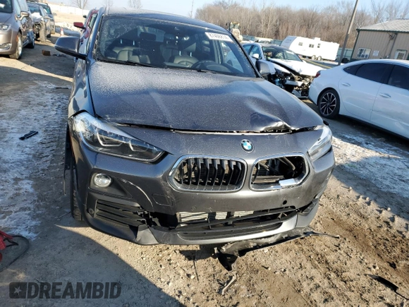 2020 BMW X2 xDrive28i with VIN WBXYJ1C00L5P51384, listed as a Copart auction lot 87406814 with 52,807 mi miles and Salvage Title. Bid and sale history available at carsss.com. Image 5.