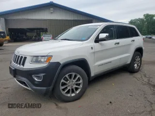2014 Jeep Grand Cherokee Limited with VIN 1C4RJFBT5EC114743, listed as a Copart auction lot 63336305 with 151,868 mi miles and Salvage title. Bid and sale history available at DreamBid. Image 1.