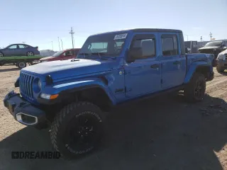 2022 Jeep Gladiator Willys with VIN 1C6JJTAM3NL132056, listed as a Copart auction lot 75723014 with 36,195 mi miles and Salvage Title. Bid and sale history available at carsss.com. Image 1.