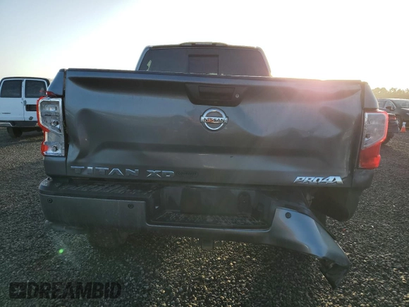 2019 Nissan Titan XD SV with VIN 1N6BA1F4XKN532266, listed as a Copart auction lot 77098244 with 105,965 mi miles and Salvage Title. Bid and sale history available at carsss.com. Image 6.