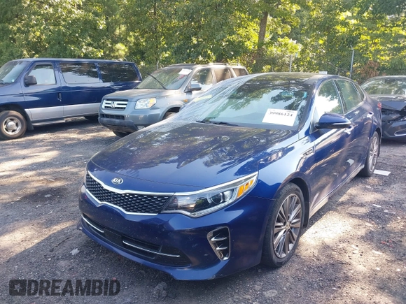 2016 Kia Optima SXL Turbo with VIN 5XXGV4L28GG087563, listed as a IAAI auction lot 39986124 with 180,160 mi miles. Bid and sale history available at carsss.com. Image 2.