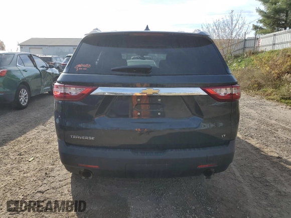 2018 Chevrolet Traverse LT Cloth z VIN 1GNERGKW9JJ179616, wystawiony jako Copart lot #77674104 z przebiegiem Nie podano mil oraz Czysty tytuł • Clean title. Historia ofert i sprzedaży dostępna na DreamBid. Obrazek 6.