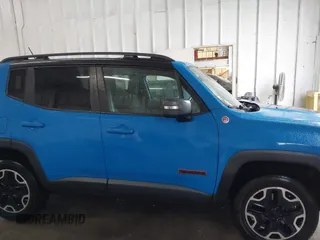 2015 Jeep Renegade Trailhawk with VIN ZACCJBCT0FPB59264, listed as a IAAI auction lot 42203406 with 109,000 mi miles and . Bid and sale history available at DreamBid. Image 13.
