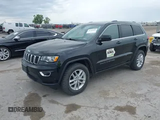 2018 Jeep Grand Cherokee Laredo E with VIN 1C4RJFAG6JC335606, listed as a IAAI auction lot 42280666 with 113,438 mi miles and . Bid and sale history available at DreamBid. Image 2.