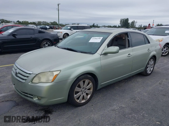 2005 Toyota Avalon XL with VIN 4T1BK36B65U005616, listed as a IAAI auction lot 41404396 with 99,397 mi miles and . Bid and sale history available at DreamBid. Image 2.