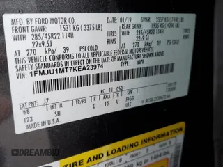 2019 Ford Expedition Platinum with VIN 1FMJU1MT7KEA23974, listed as a Copart auction lot 53355755 with 81,916 mi miles and Salvage title. Bid and sale history available at DreamBid. Image 14.