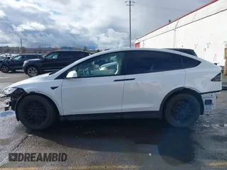 2022 Tesla Model X with VIN 7SAXCDE56NF360208, listed as a IAAI auction lot 41576953 with 9,759 mi miles. Bid and sale history available at carsss.com. Image 15.