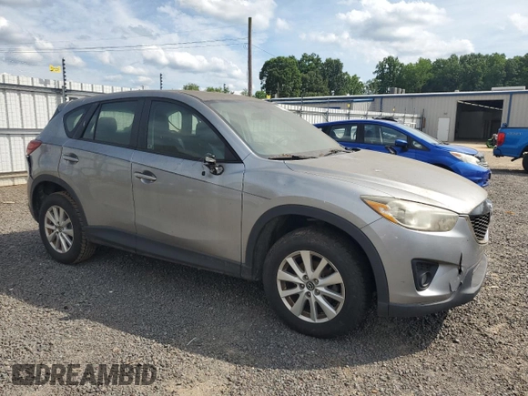 2014 Mazda CX-5 Sport with VIN JM3KE2BE7E0350965, listed as a Copart auction lot 60130195 with 196,072 mi miles and Clean title. Bid and sale history available at DreamBid. Image 4.