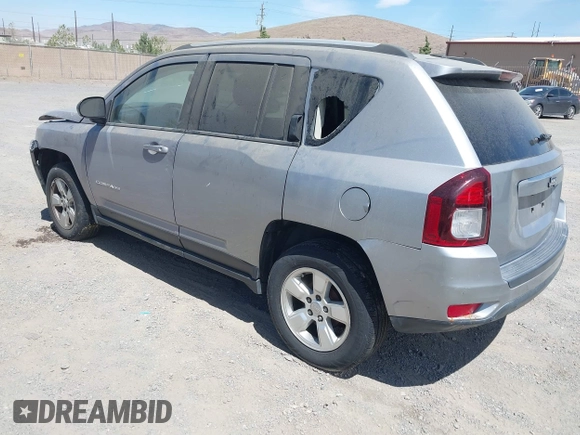 2016 Jeep Compass Sport with VIN 1C4NJCBB2GD577084, listed as a IAAI auction lot 42572348 with 164,234 mi miles and . Bid and sale history available at DreamBid. Image 3.