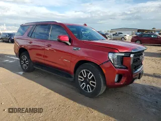 2023 GMC Yukon AT4 with VIN 1GKS2CKD7PR470556, listed as a Copart auction lot 51233645 with 30,735 mi miles and Salvage Title. Bid and sale history available at carsss.com. Image 4.
