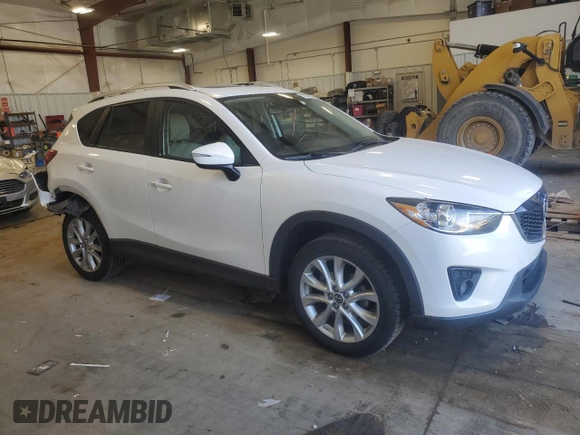 2015 Mazda CX-5 Grand Touring with VIN JM3KE4DY5F0538016, listed as a Copart auction lot 52396685 with 137,272 mi miles and Clean Title. Bid and sale history available at carsss.com. Image 4.