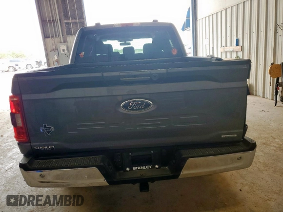 2021 Ford F-150 XL with VIN 1FTEW1CP1MFC04764, listed as a Copart auction lot 59572975 with 61,576 mi miles and Salvage title. Bid and sale history available at DreamBid. Image 6.