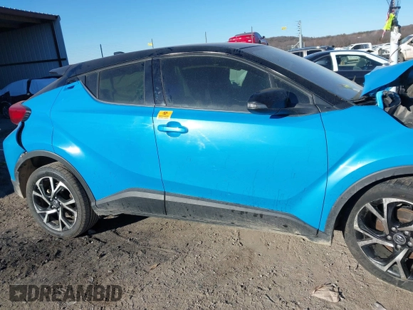 2019 Toyota C-HR XLE with VIN JTNKHMBX9K1056627, listed as a IAAI auction lot 41030089 with 1 mi miles. Bid and sale history available at carsss.com. Image 12.