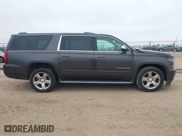 2017 Chevrolet Suburban Premier with VIN 1GNSKJKC3HR201180, listed as a IAAI auction lot 41516652 with Not Provided miles and . Bid and sale history available at DreamBid. Image 13.