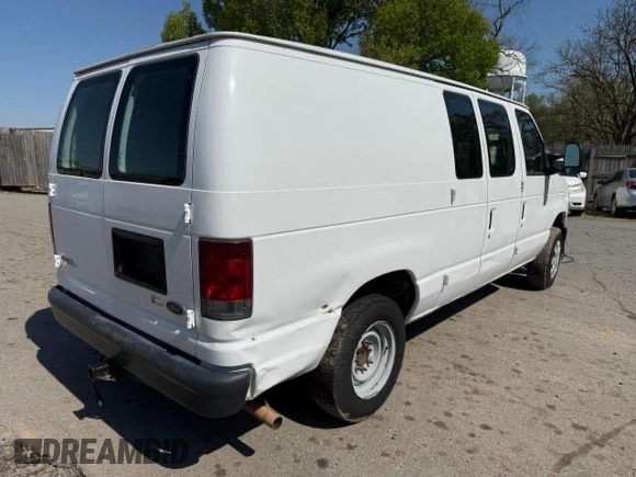 2010 Ford Econoline Cargo Commercial with VIN 1FTNE1EW6ADA36473, listed as a Copart auction lot 55557795 with 476,354 mi miles and Clean Title. Bid and sale history available at DreamBid. Image 4.