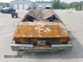 1985 Cadillac Seville z VIN 1G6KS6988FE825863, wystawiony jako Copart lot #52723115 z przebiegiem Nie podano mil oraz Szkoda całkowita • Salvage title. Historia ofert i sprzedaży dostępna na DreamBid. Obrazek 6.