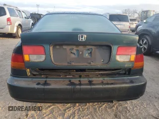 1997 Honda Civic DX with VIN 1HGEJ612XVL075429, listed as a Copart auction lot 76950574 with 0 mi miles and Salvage Title. Bid and sale history available at carsss.com. Image 6.