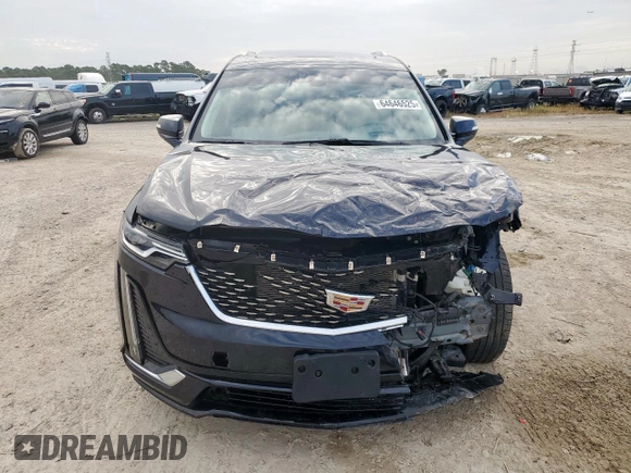 2022 Cadillac XT6 Premium Luxury with VIN 1GYKPCRS1NZ152828, listed as a Copart auction lot 64646525 with 18,913 mi miles and Salvage title. Bid and sale history available at DreamBid. Image 5.