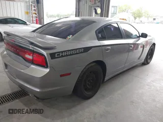 2013 Dodge Charger SE with VIN 2C3CDXBG7DH601545, listed as a IAAI auction lot 40332328 with 162,992 mi miles. Bid and sale history available at carsss.com. Image 4.