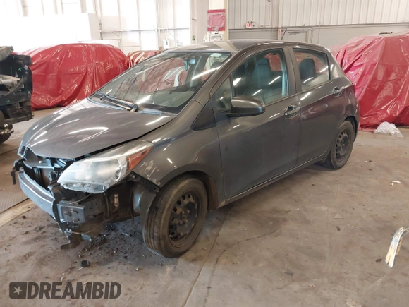 2015 Toyota Yaris L with VIN VNKKTUD36FA049550, listed as a IAAI auction lot 41671226 with 129,540 mi miles. Bid and sale history available at carsss.com. Image 17.