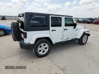 2014 Jeep Wrangler Unlimited Sahara with VIN 1C4BJWEG5EL309502, listed as a Copart auction lot 61804885 with 60,683 mi miles and Salvage title. Bid and sale history available at DreamBid. Image 3.