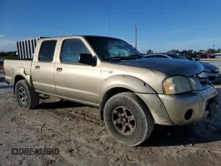 2004 Nissan Frontier XE with VIN 1N6ED27T34C400304, listed as a Copart auction lot 87015254 with 234,539 mi miles and Salvage title. Bid and sale history available at DreamBid. Image 4.
