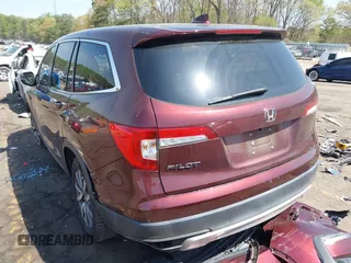 2021 Honda Pilot EX-L with VIN 5FNYF5H56MB012112, listed as a IAAI auction lot 41934360 with 46,820 mi miles. Bid and sale history available at carsss.com. Image 3.