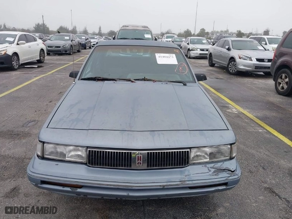 1996 Oldsmobile Ciera 1SA + VX5 with VIN 1G3AJ55MXT6363966, listed as a IAAI auction lot 41404473 with NaN miles. Bid and sale history available at carsss.com. Image 6.
