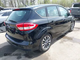 2017 Ford C-Max Energi Titanium with VIN 1FADP5FU2HL115199, listed as a IAAI auction lot 42001944 with 57,609 mi miles. Bid and sale history available at carsss.com. Image 4.