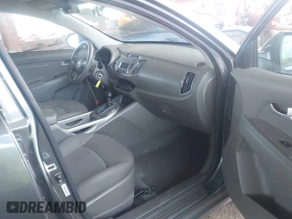 2014 Kia Sportage LX with VIN KNDPB3ACXE7588801, listed as a IAAI auction lot 42180018 with 192,062 mi miles and . Bid and sale history available at carsss.com. Image 5.